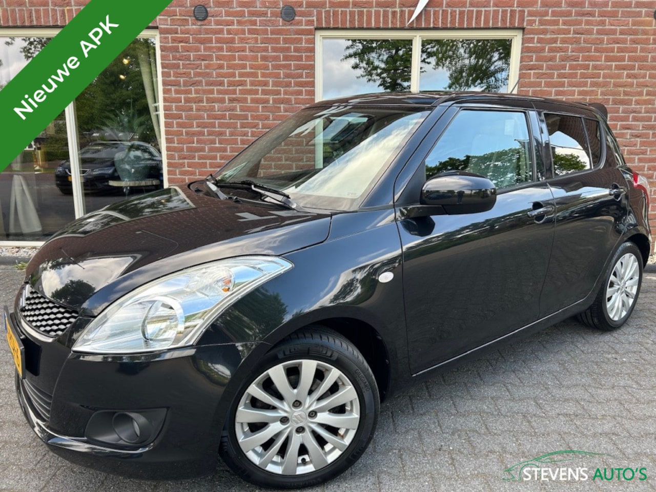 Suzuki Swift - 1.2 Exclusive EASSS NIEUWE APK / LICHTMETALEN VELGEN / AIRCO / C - AutoWereld.nl