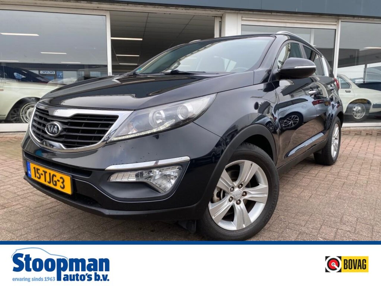 Kia Sportage - 1.6 X-ecutive + Pack Clima Cruise H.leder PDC Trekh. - AutoWereld.nl