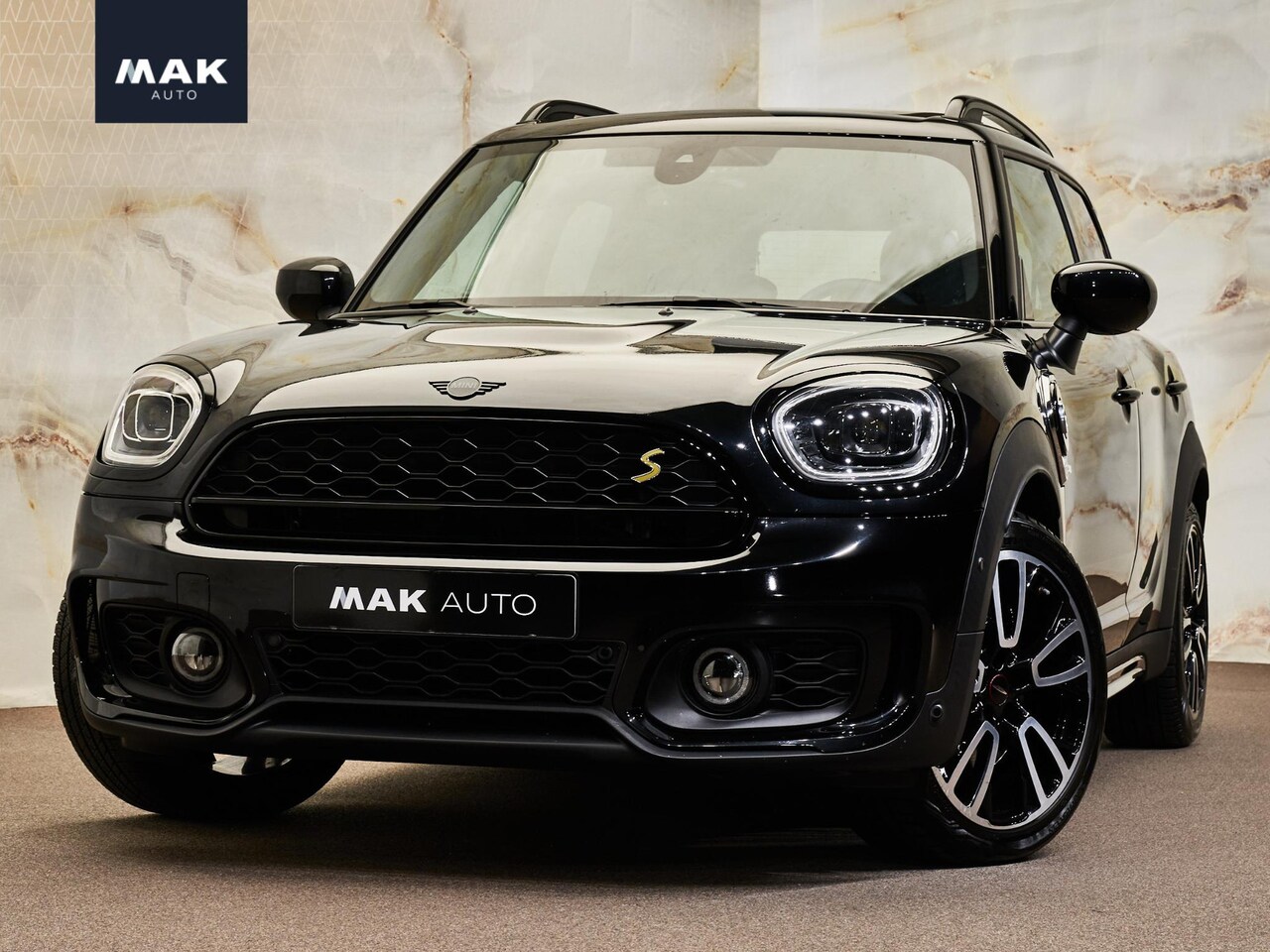 MINI Countryman - 1.5 Cooper SE ALL4 John Cooper Works, NL-auto, JCW pakket, 19", H/K, pano, LED-kopl., carb - AutoWereld.nl
