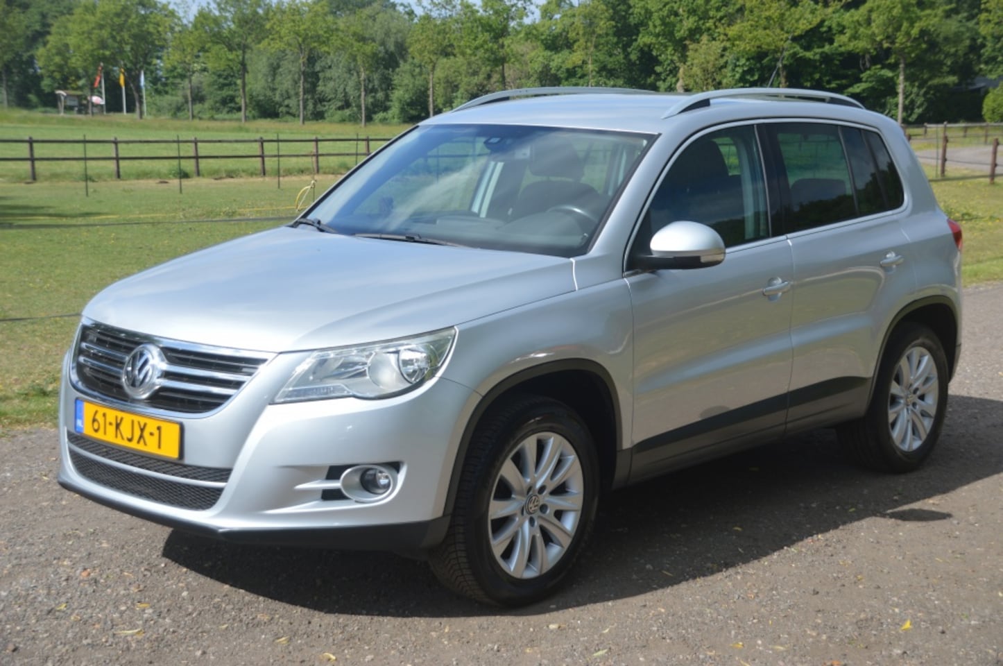 Volkswagen Tiguan - 1.4 TSI Sport&Style Clima Cruise Navi Trekhaak - AutoWereld.nl