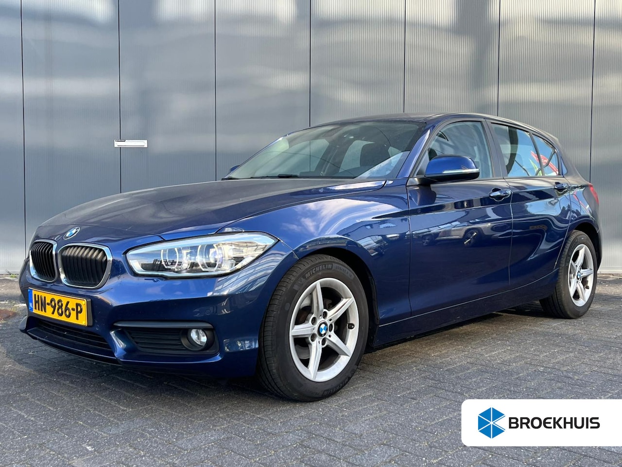 BMW 1-serie - 118i 136pk EDE Corporate Lease Essential Climate control | Sportstoelen | Parkeersensoren - AutoWereld.nl