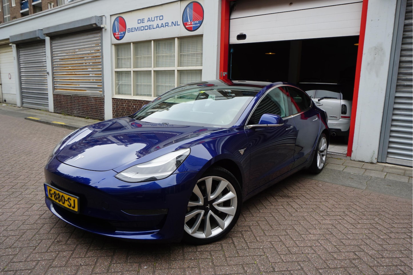 Tesla Model 3 - Long Range RWD Long Range AWD 75 kWh Dual Motor | Nederlandse BTW auto | Panorama | Auto Pilot | Leer | E - AutoWereld.nl
