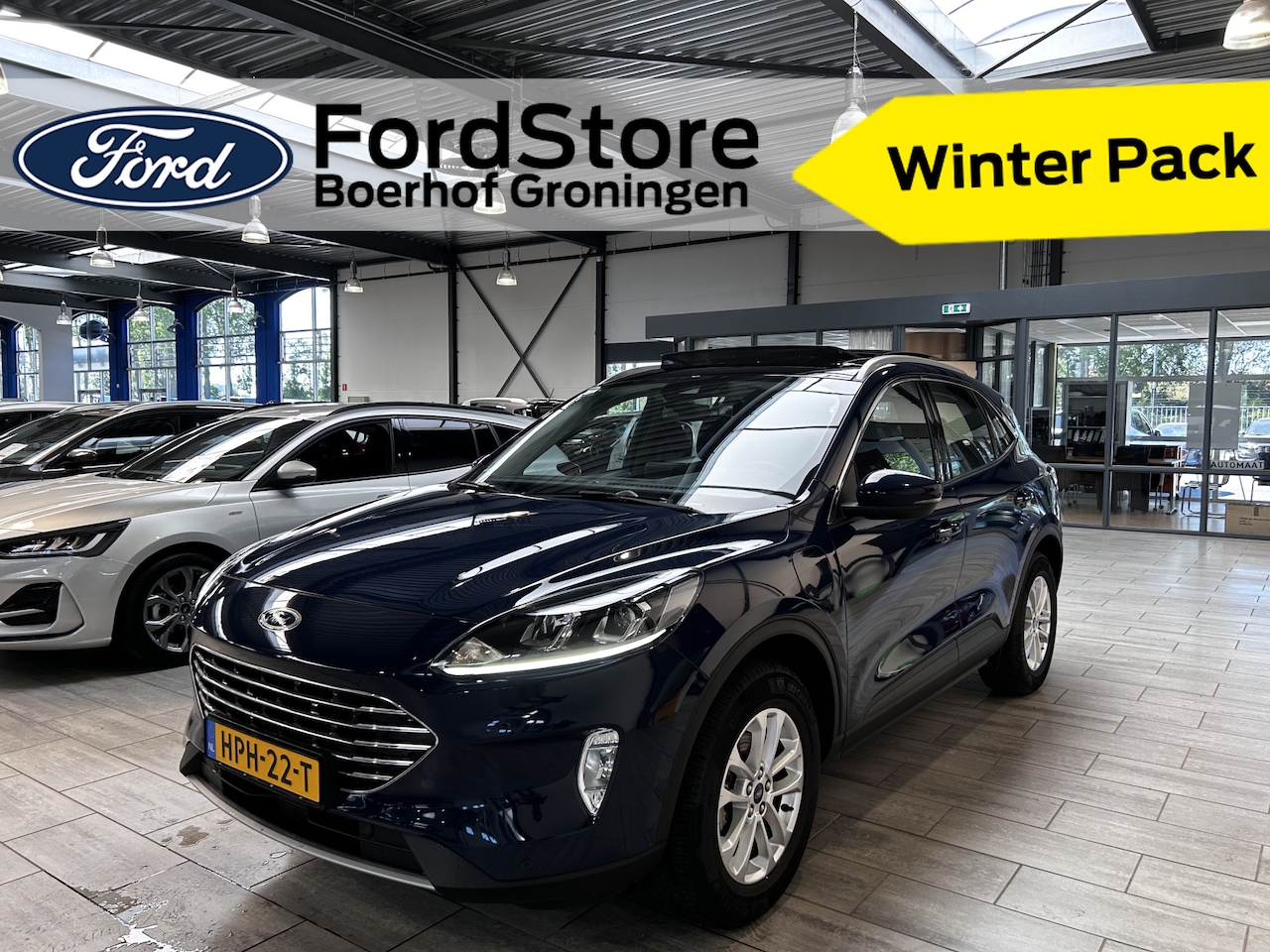 Ford Kuga - 2.5 PHEV 225pk Titanium |Stoelverwarming | Camera | Panorama dak | Keyless | Cruise | All- - AutoWereld.nl