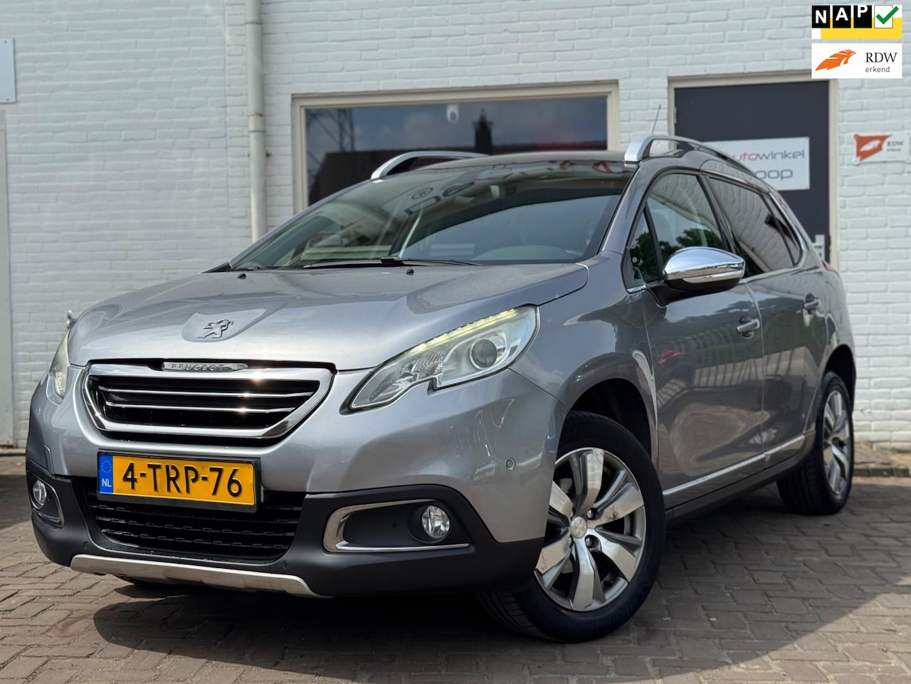 Peugeot 2008 - 1.2 VTi Automaat Leer Executive - AutoWereld.nl