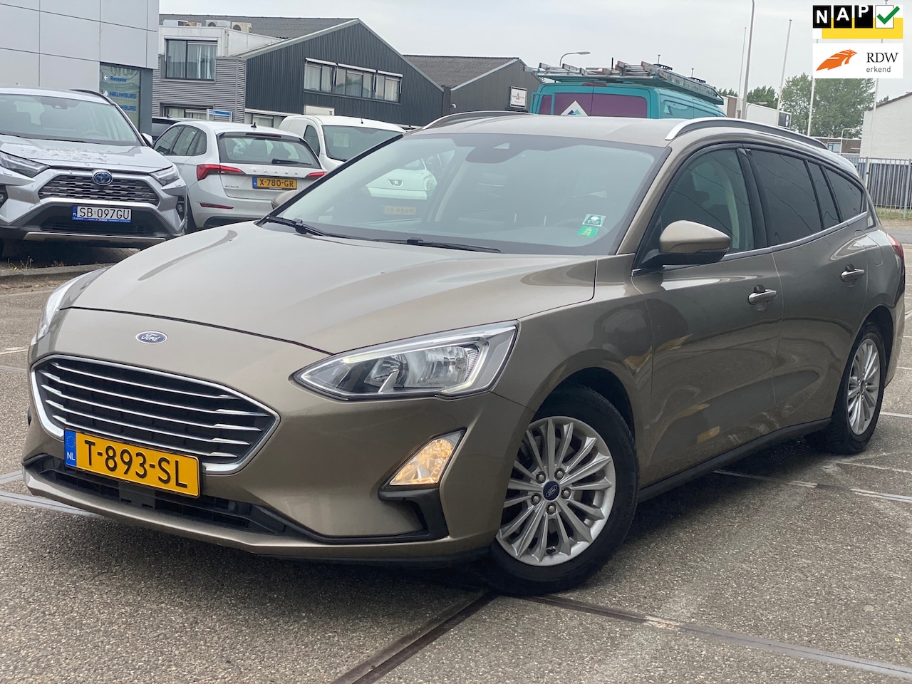 Ford Focus Wagon - 1.5 EcoBoost Titanium Business/ 1e EIG/ 1jaar apk/ pdc/ stoelverwarming/ stuur verwarming/ - AutoWereld.nl