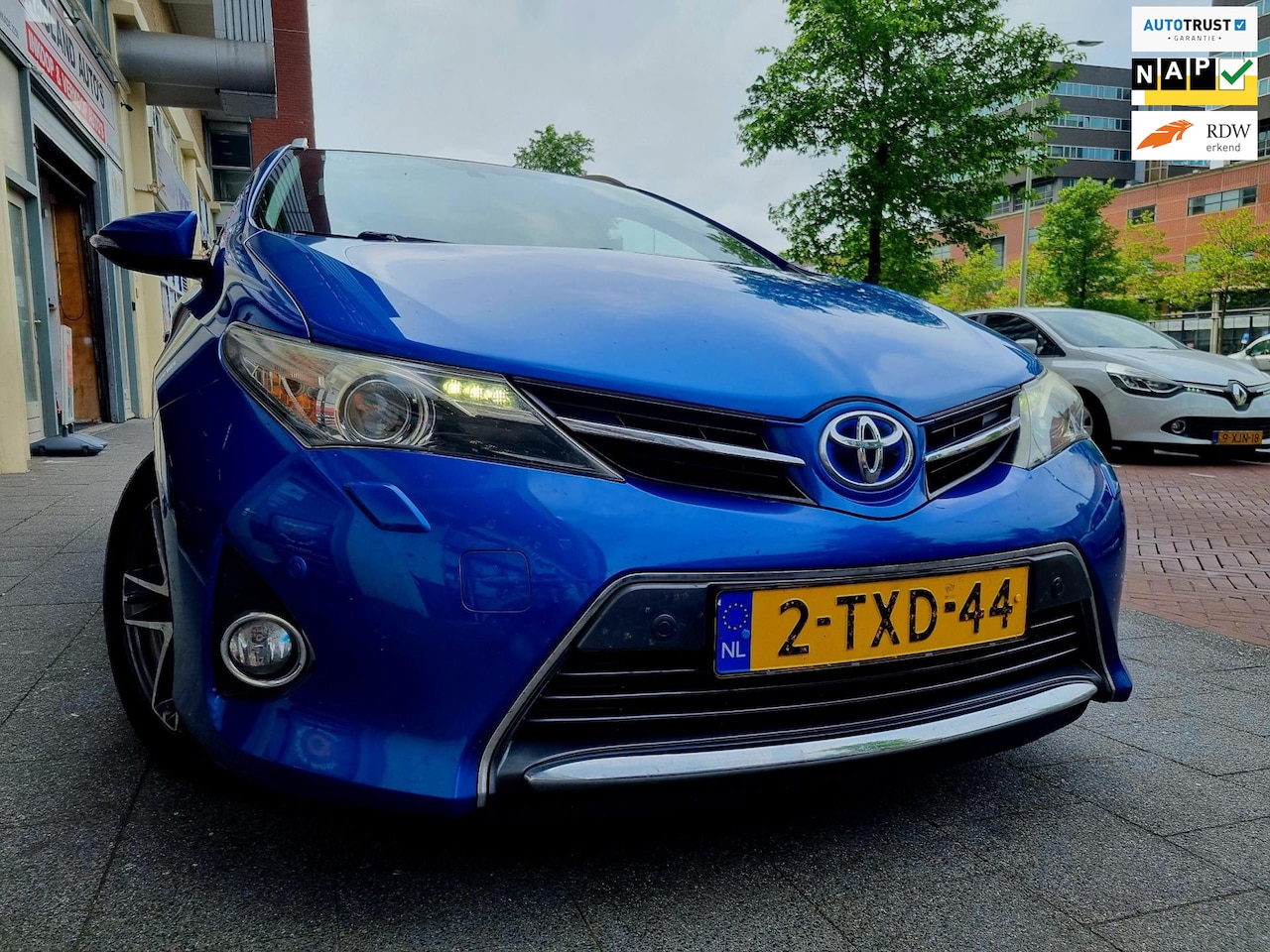 Toyota Auris Touring Sports - 1.8 Hybrid Lease PanoDak Navi Camera - AutoWereld.nl