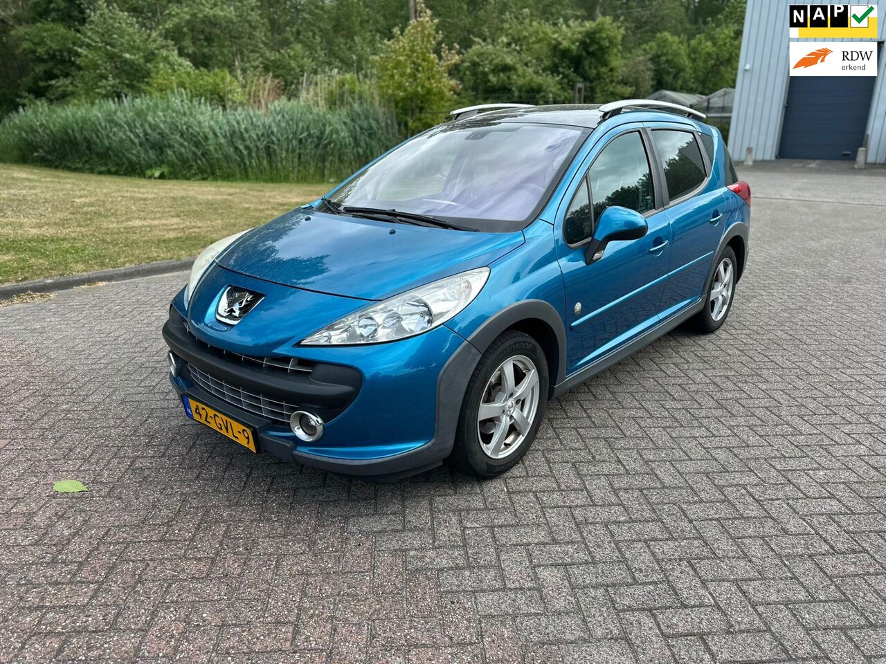 Peugeot 207 SW Outdoor - 1.6 VTi XS/AIRCO/CRUISE/HALF LEDER/PANO/TREKHAAK - AutoWereld.nl
