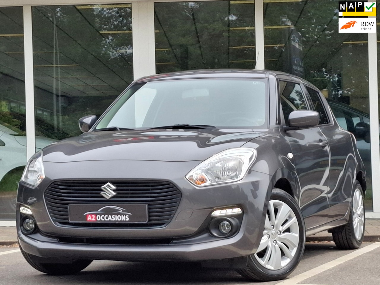 Suzuki Swift - 1.2 4 Cilinder Camera/Bluetooth/Stoelverwarming/Airco - AutoWereld.nl