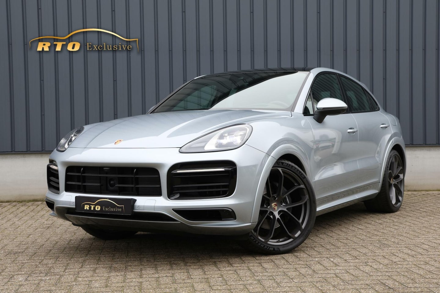 Porsche Cayenne Coupé - 3.0 E-Hybrid|Sportdesign|luchtvering|22'' - AutoWereld.nl