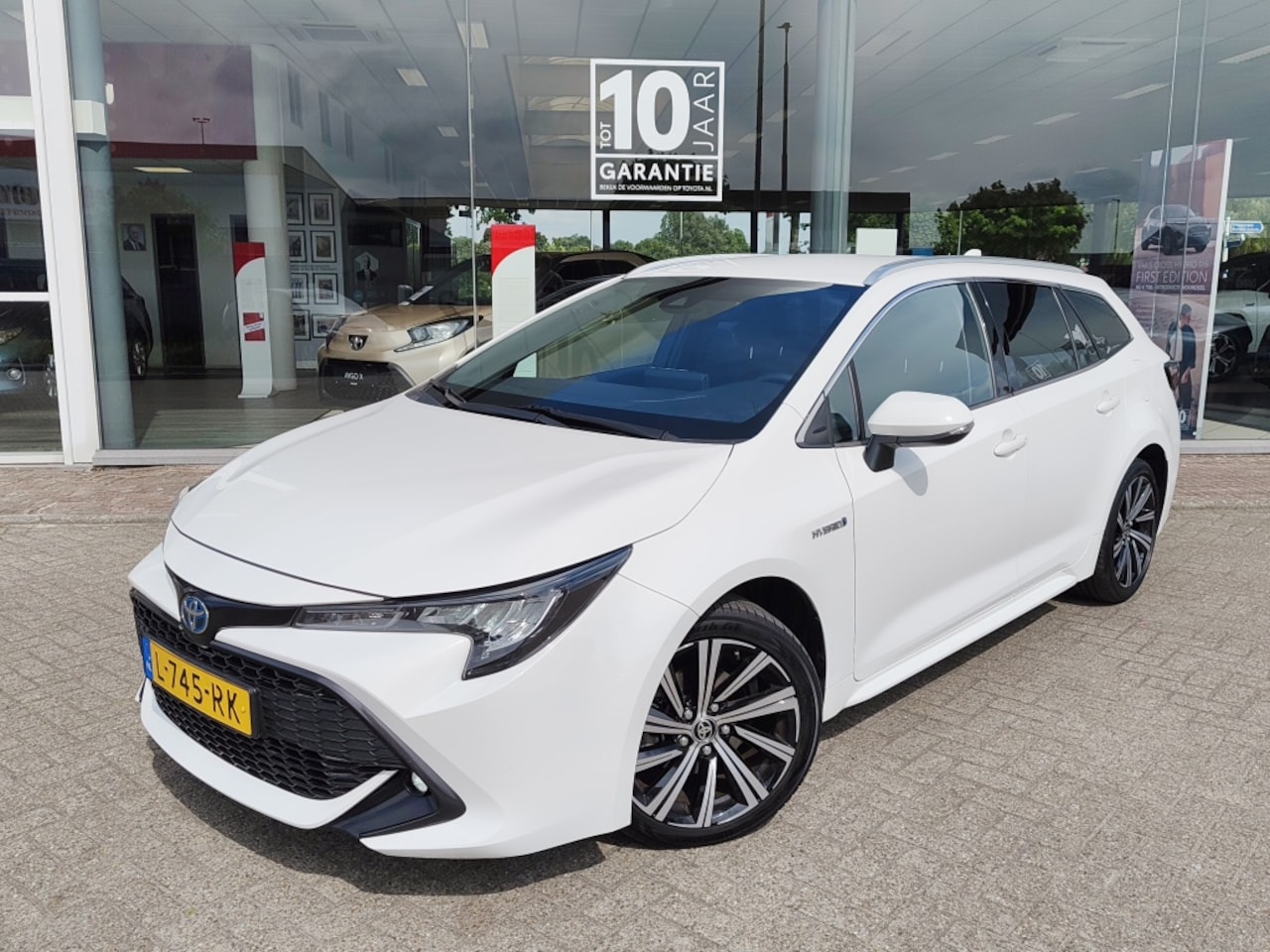 Toyota Corolla Touring Sports - 1.8 Hybrid Dynamic | Stoelverwarming | Draadloze Telefoonlader | - AutoWereld.nl