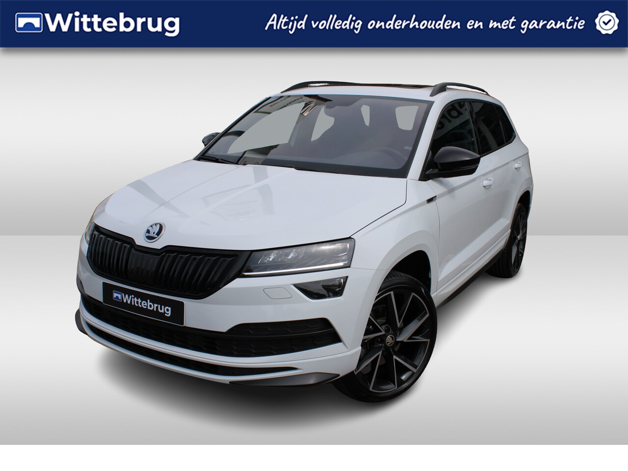 Skoda Karoq - 1.5 TSI ACT 150pk Sportline DSG Automaat / Panoramadak / LM 19 inch / Digital cockpit / Ca - AutoWereld.nl