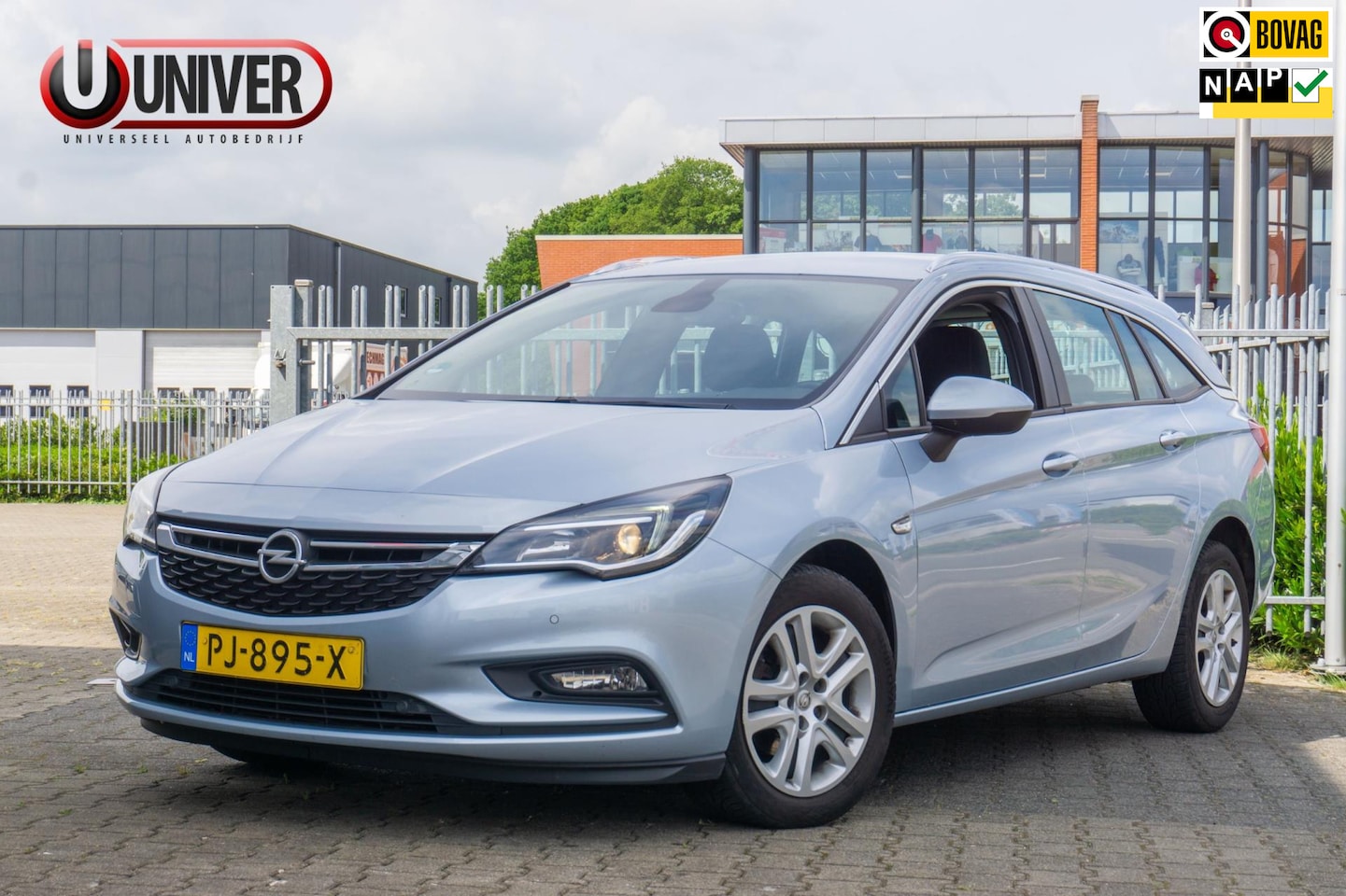 Opel Astra Sports Tourer - 1.4 Online Edition CAMERA/CRUISE/NAVI - AutoWereld.nl