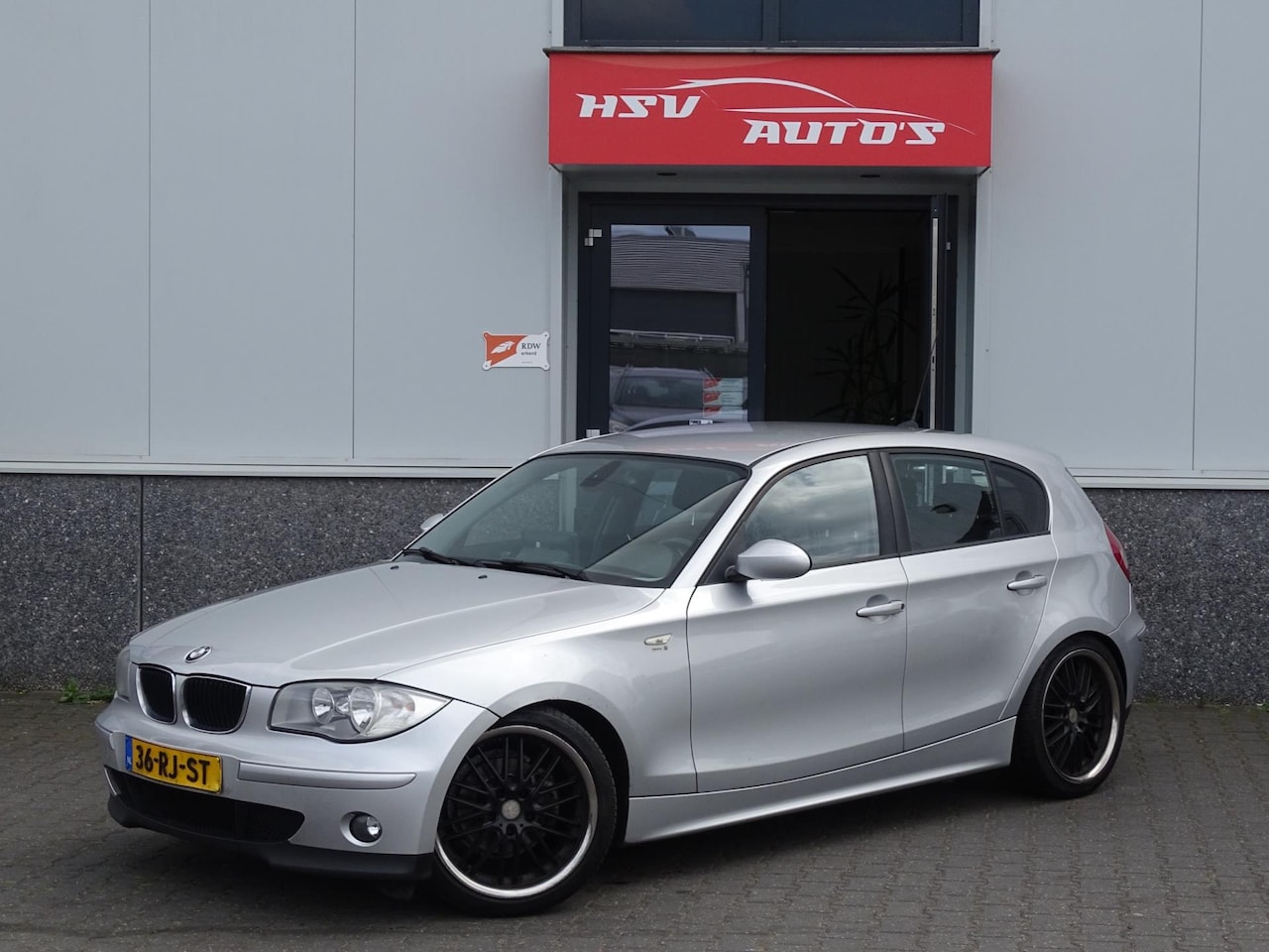 BMW 1-serie - 118d High Executive navi LM 4-deurs - AutoWereld.nl