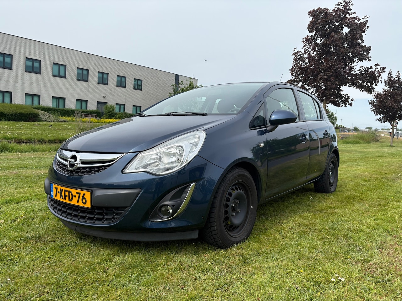 Opel Corsa - 1.4-16V Design Edition * Stoelverwarming * Stuurwielverwarming * Unieke KM-Stand - AutoWereld.nl
