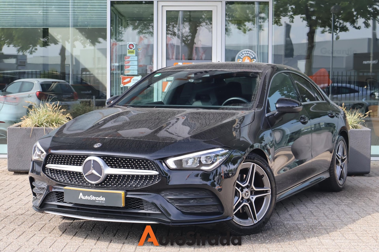 Mercedes-Benz CLA-Klasse - Coupé 180 AMG-Line 136pk | Camera | Navi | Stoelverwarming | Cruise | Climate | LED - AutoWereld.nl