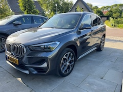BMW X1 - sDrive20i Orange Edition (F49) 2021 High Exec , weinig KM, full option, Garantie (02-2026) + Service (10-2026)