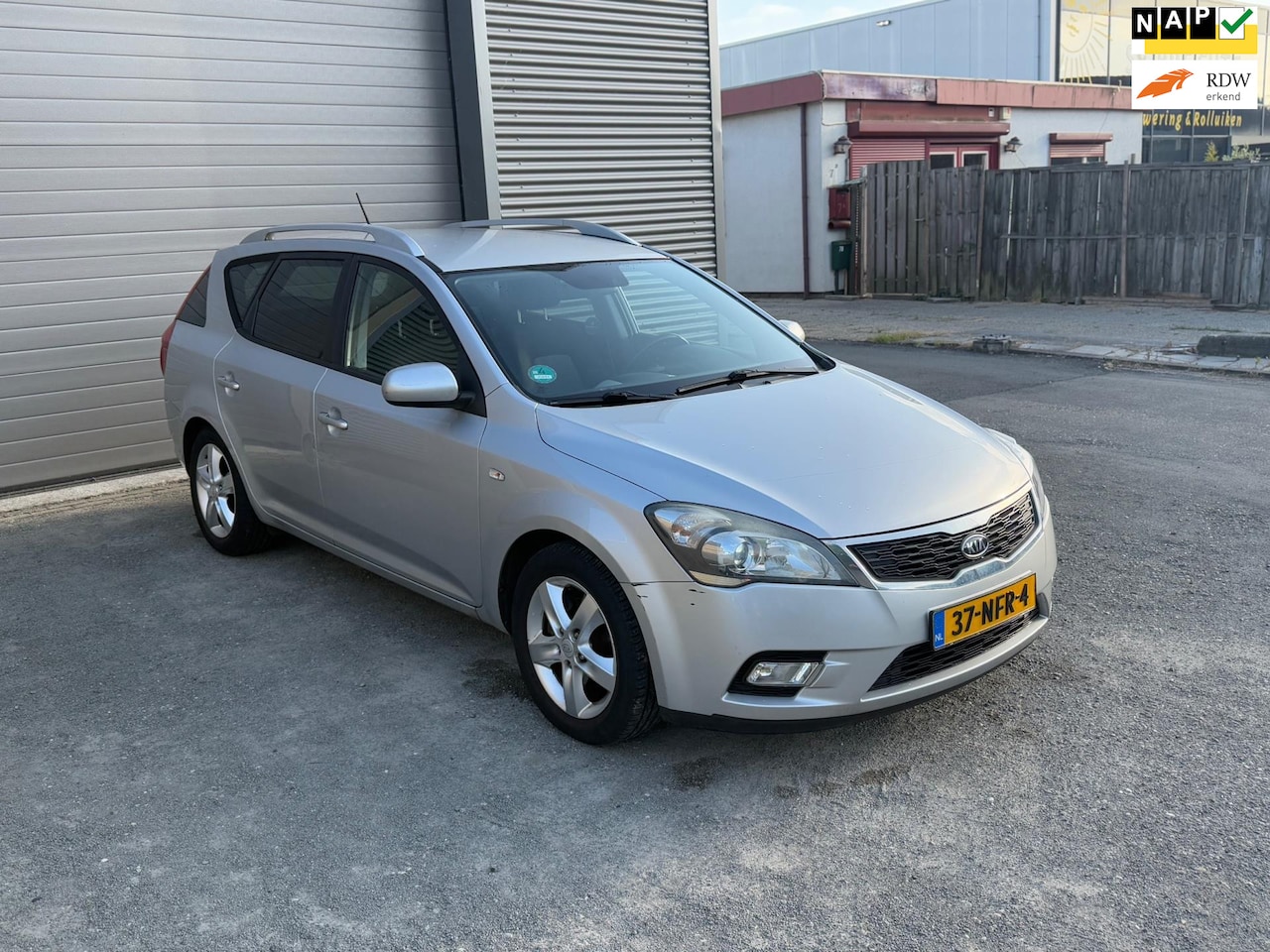 Kia Cee'd - 1.4 CVVT X-ecutive 1.4 CVVT X-ecutive - AutoWereld.nl