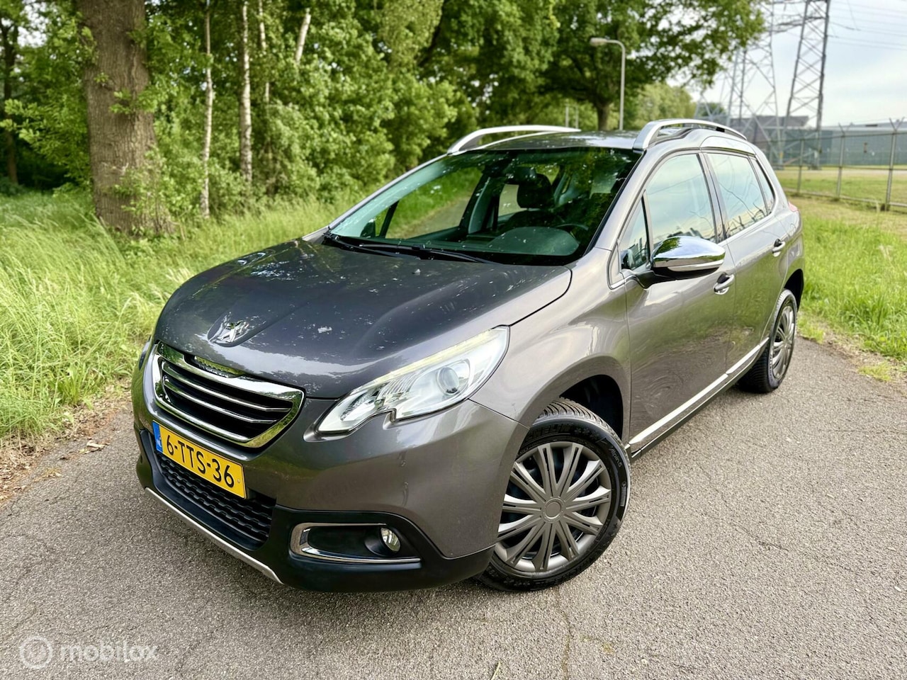 Peugeot 2008 - 1.6 VTi Grijs Automaat PDC Clima Navi NAP ✅ - AutoWereld.nl
