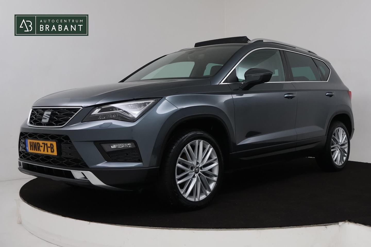 Seat Ateca - 1.5 TSI Style (PANORAMADAK, TREKHAAK, NAVIGATIE, CRUISE CONTROL, STOELVERWARMING, ACHTERUI - AutoWereld.nl