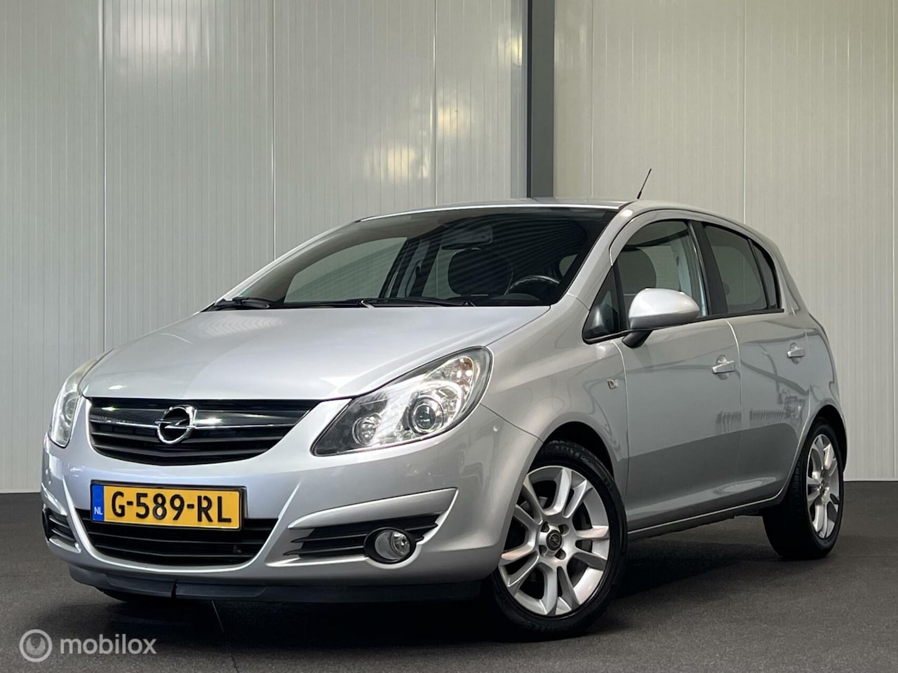 Opel Corsa - 1.4-16V Cosmo 5-drs [ VOLAUTOMAAT ] - AutoWereld.nl