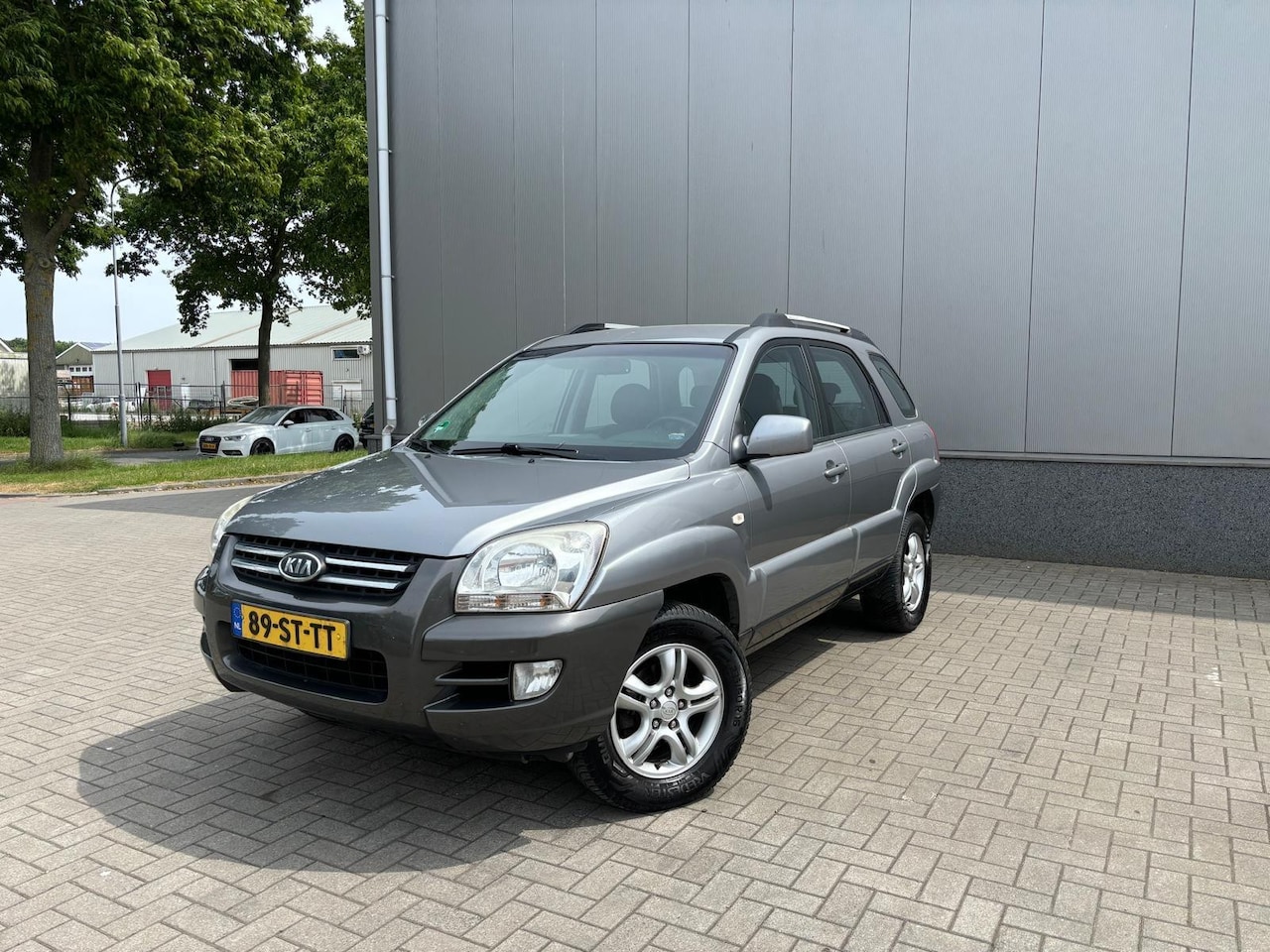 Kia Sportage - 2.0 CVVT Executive 2.0 CVVT Executive - AutoWereld.nl
