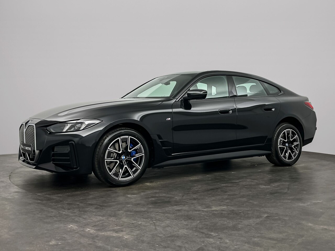 BMW i4 - eDrive40 Gran Coupé M Sportpakket | Comfort Pack | Schuifdak | Trekhaak | Driving Assistan - AutoWereld.nl