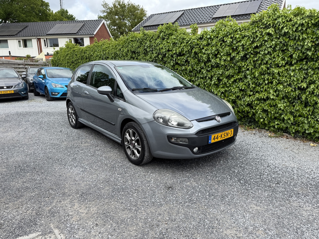 Fiat Punto Evo - 1.4 Racing | Navi | Autom. Airco | Cruise Control | LMV | Privacy Glass | Trekhaak | APK t - AutoWereld.nl