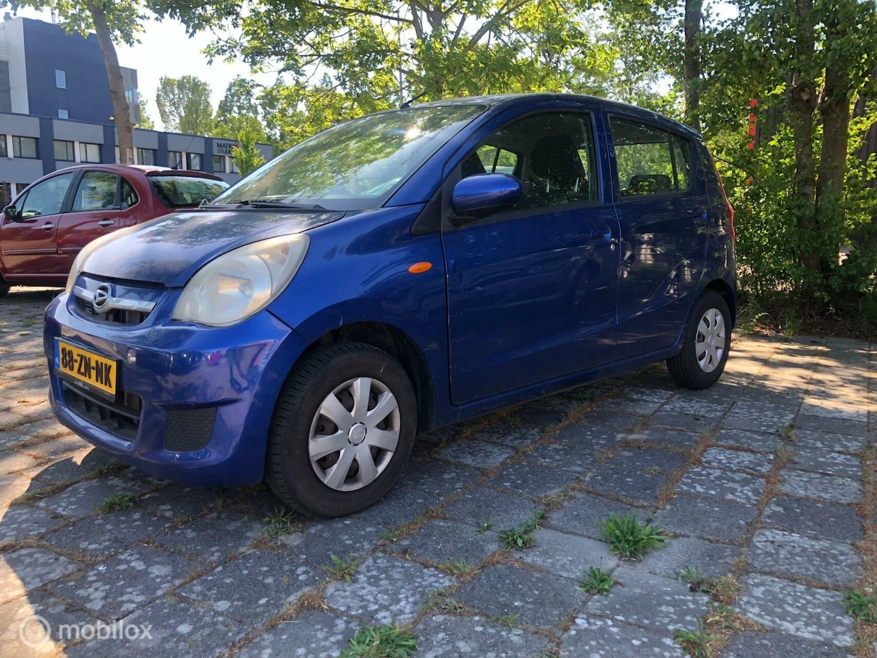 Daihatsu Cuore - 1.0 Premium 1.0 Premium - AutoWereld.nl