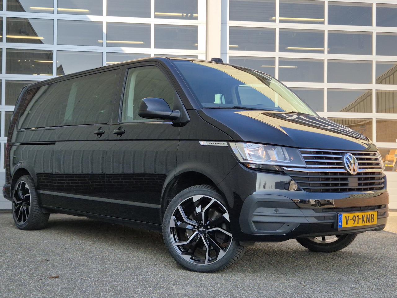 Volkswagen Transporter Caravelle - 2.0 TDI 204Pk L2H1 | NAVI | ACC | TREKHAAK | - AutoWereld.nl