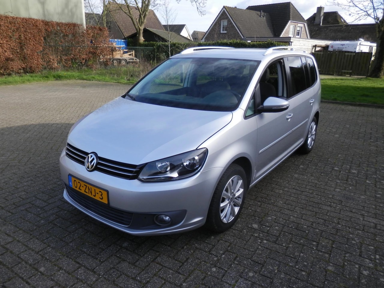 Volkswagen Touran - 1.2 TSI Highline BlueMotion airco navi - AutoWereld.nl