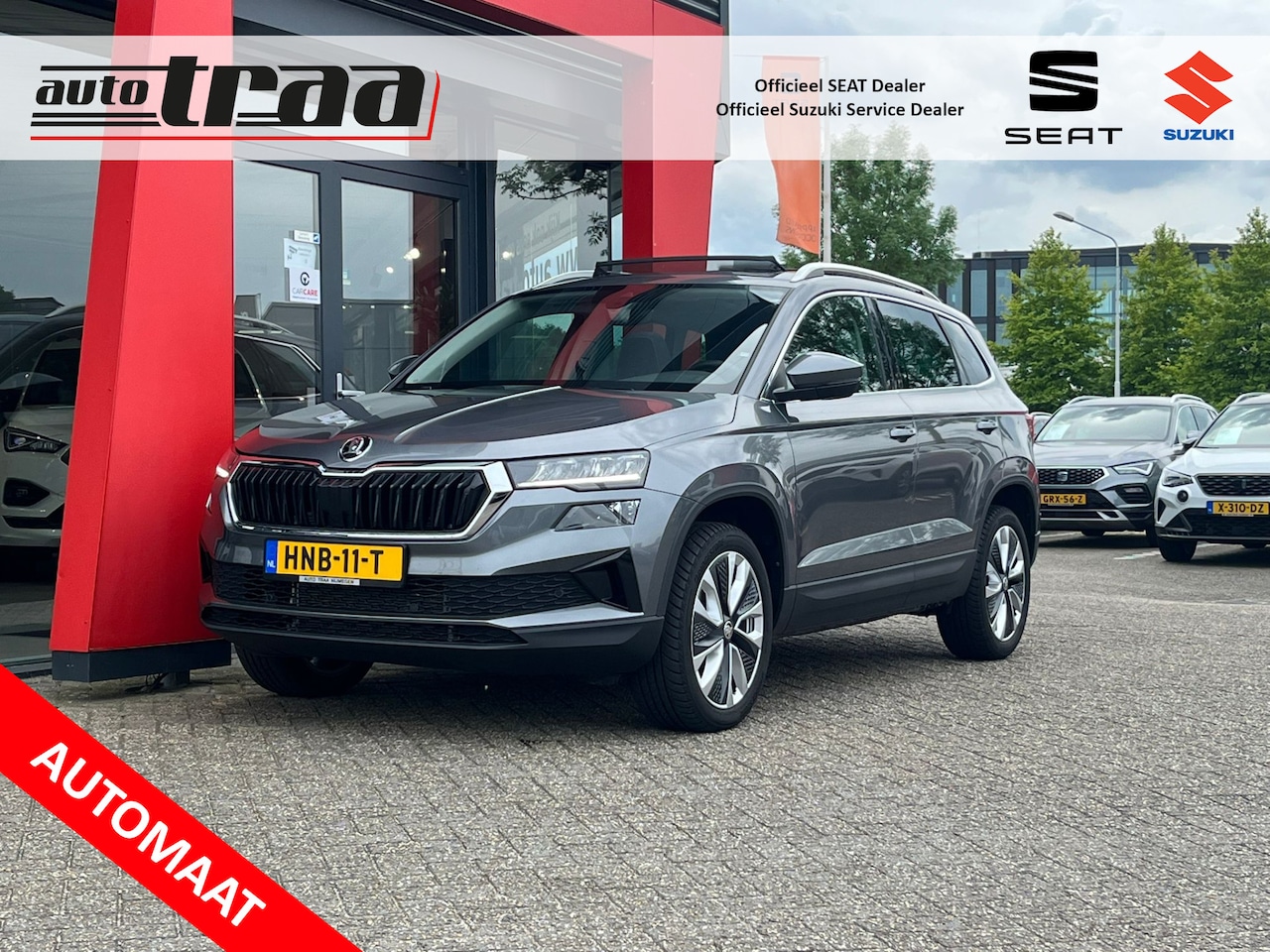 Skoda Karoq - 1.5 TSI ACT Business Edition / 18'' LMV / ELEK. KLEP / PAN-SCHUIF DAK / - AutoWereld.nl