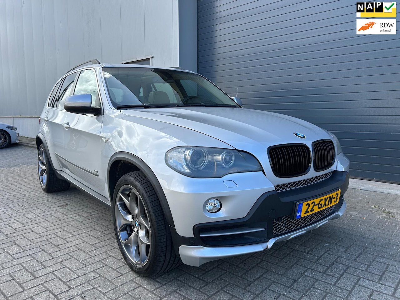 BMW X5 - XDrive 4.8i HIGH EXE AUT NAVI PANO LEDER - AutoWereld.nl