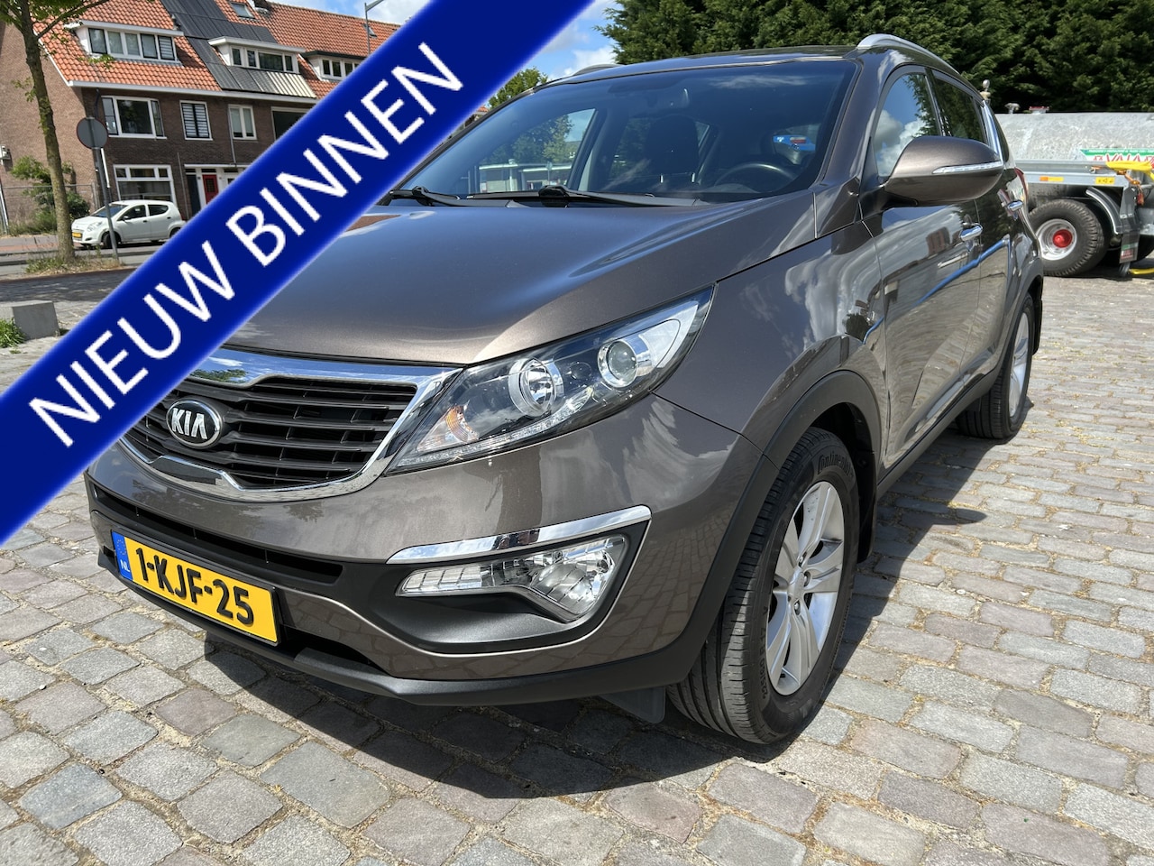Kia Sportage - 1.6 GDI Plus Pack navi/camera airco/ecc keurige auto - AutoWereld.nl