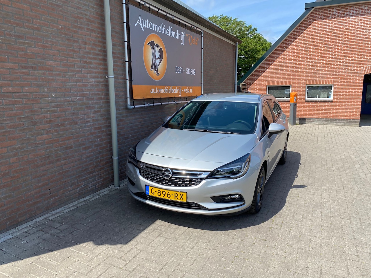 Opel Astra Sports Tourer - 1.0 Turbo 120 Jaar Edition 1.0 Turbo 120 Jaar Edition - AutoWereld.nl