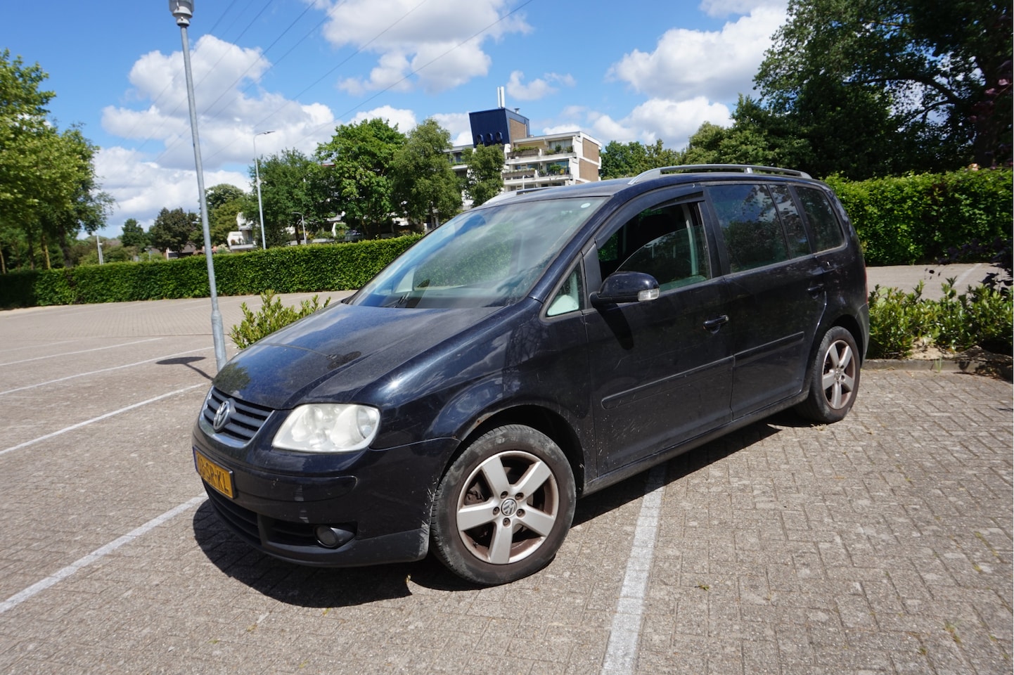 Volkswagen Touran - 2.0-16V FSI Highline 7 pers. - AutoWereld.nl