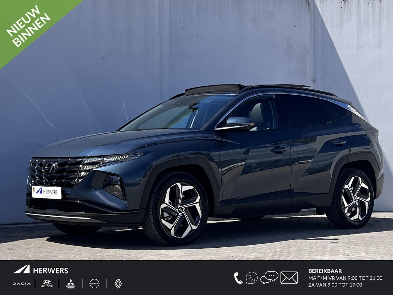 Hyundai Tucson - 1.6 T-GDI HEV 230 Premium Sky Automaat / Goed onderhouden / Leder / Stuur-, stoel- en acht - AutoWereld.nl