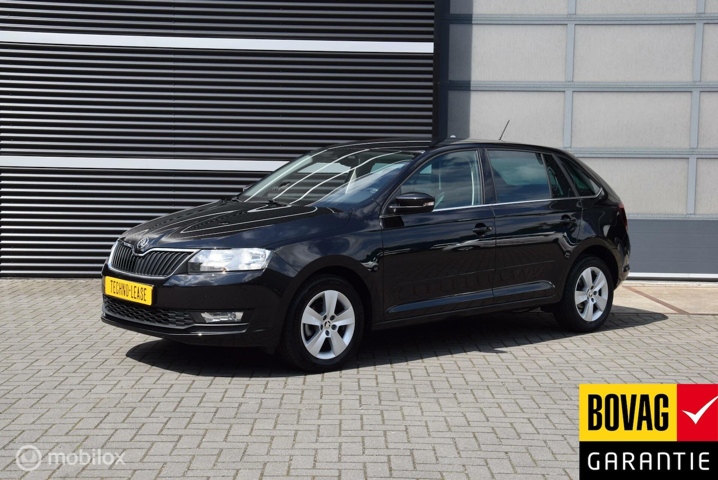 Skoda Rapid Spaceback - 1.0TSI Business edition stoelverwarming cruise control - AutoWereld.nl