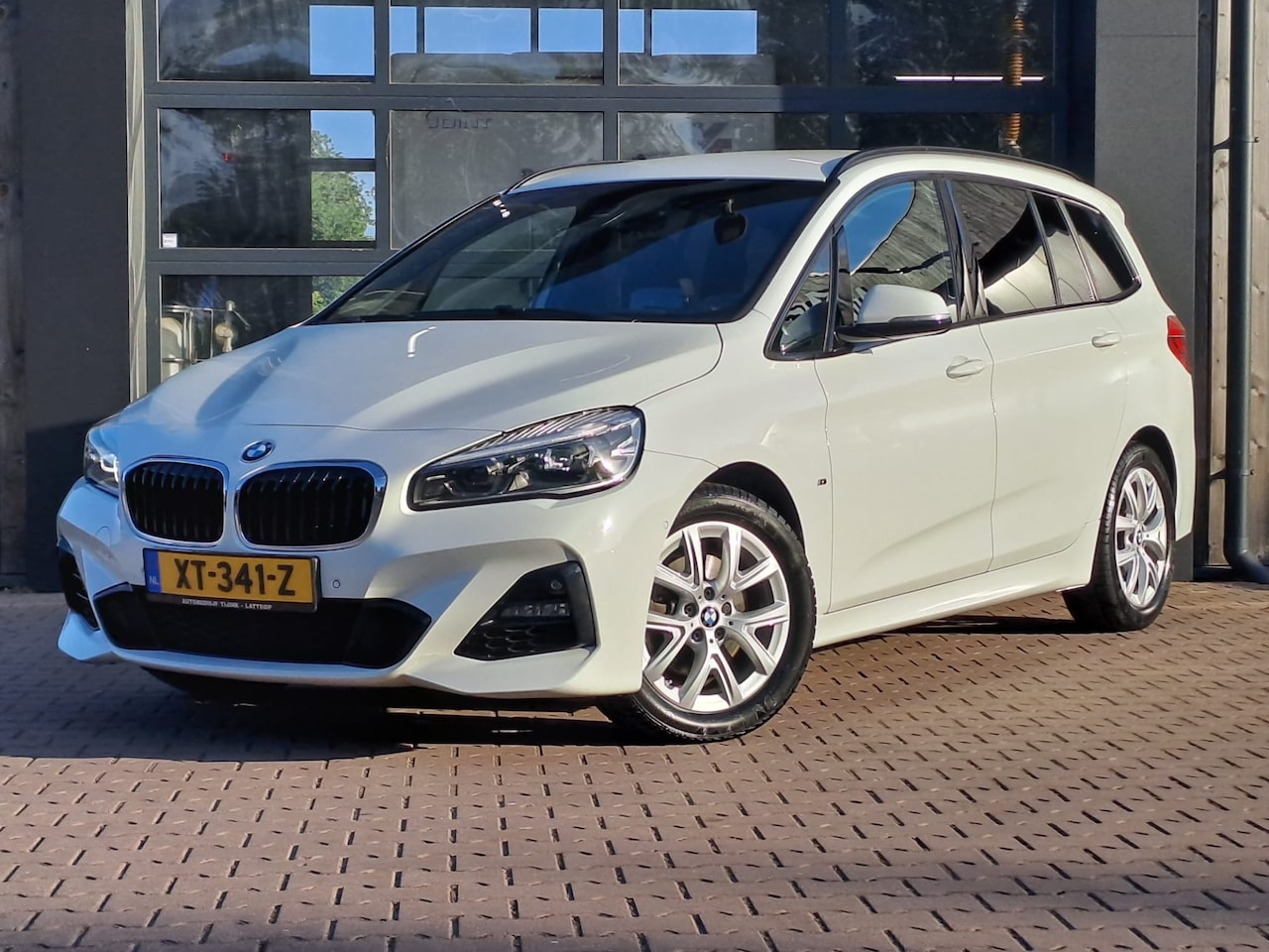 BMW 2-serie Gran Tourer - 218i 7p. High Executive | Leder | Trekhaak | M-pakket | Head-up | Camera | Stoelverwarming - AutoWereld.nl