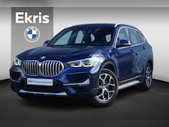 BMW X1 - sDrive20i High Executive X Line 18'' / Trekhaak / Verwarmde voorstoelen / Parking Pack