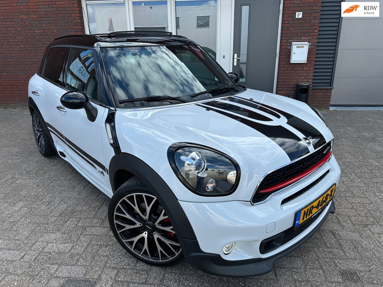 MINI Countryman - Mini 1.6 John Cooper Works ALL4 Chili / Pano / Navi / Leder / PDC / Harman Kardon - AutoWereld.nl
