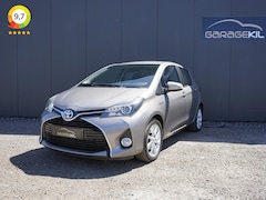 Toyota Yaris - 1.5 Hybrid Dynamic 1ste eigenaar / 16'' LM velgen / Dealer onderh. / Camera / Nav / Keyles