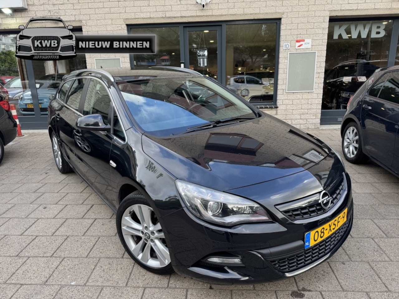 Opel Astra Sports Tourer - 1.4 Turbo Sport Trekhaak Navi 2012 - AutoWereld.nl