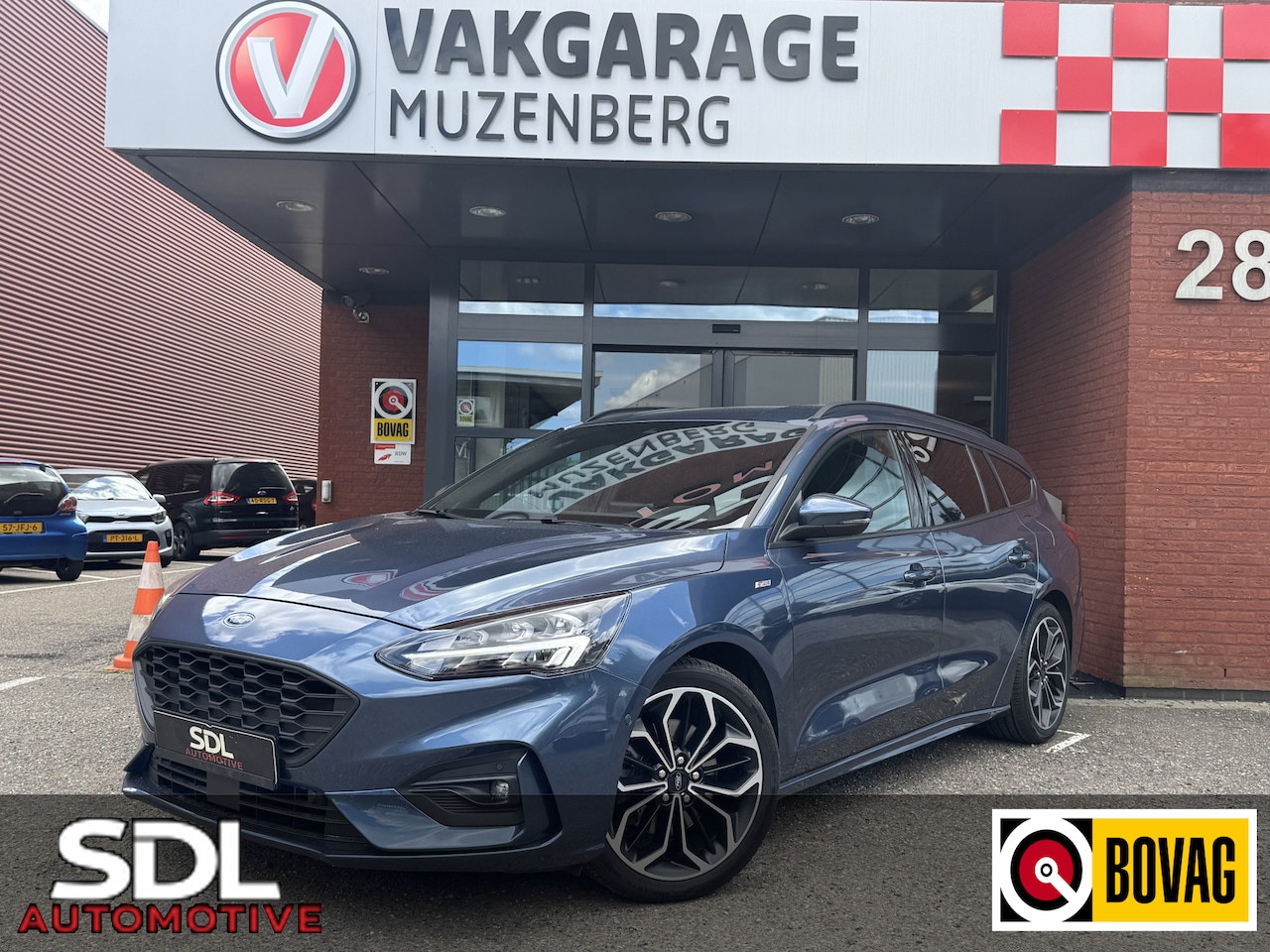 Ford Focus Wagon - 1.5 EcoBoost ST Line // CRUISE // NAVI // AIRCO // CAMERA // TREKHAAK // APPLE CARPLAY / A - AutoWereld.nl