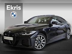 BMW i4 - eDrive40 High Executive | M Sportpakket | Schuif-kantel dak | M Achterspoiler