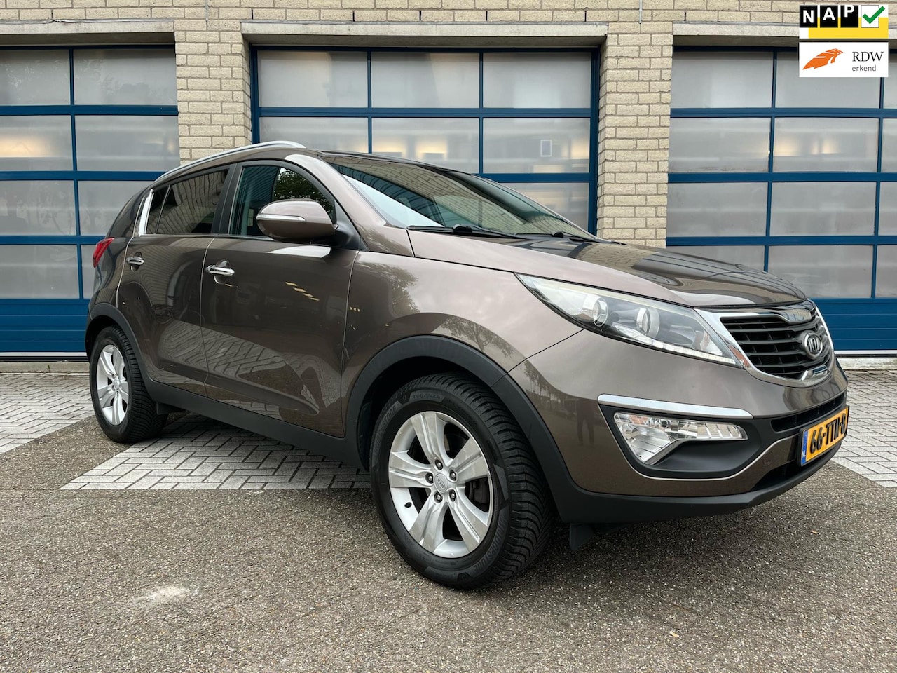 Kia Sportage - 2.0 X-ecutive Plus Pack Clima - Trekhaak - Sensoren - LED - Navi - Bluetooth - isofix - AutoWereld.nl