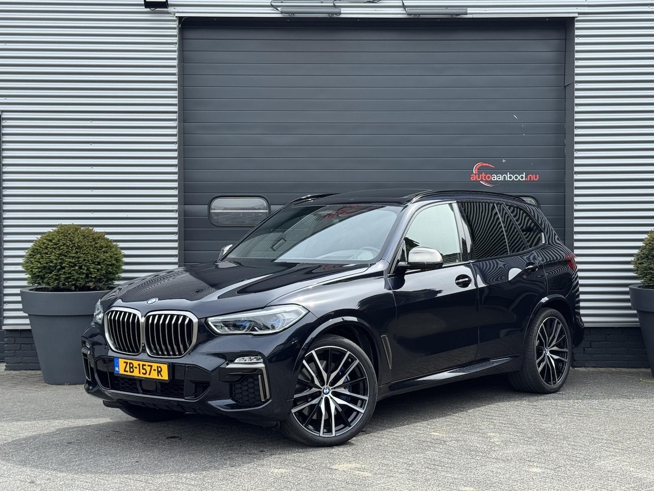 BMW X5 - M50d High Executive | Panorama dak | TV Schermen | Bowers & Wilkins | 360 Camera | Laser | - AutoWereld.nl