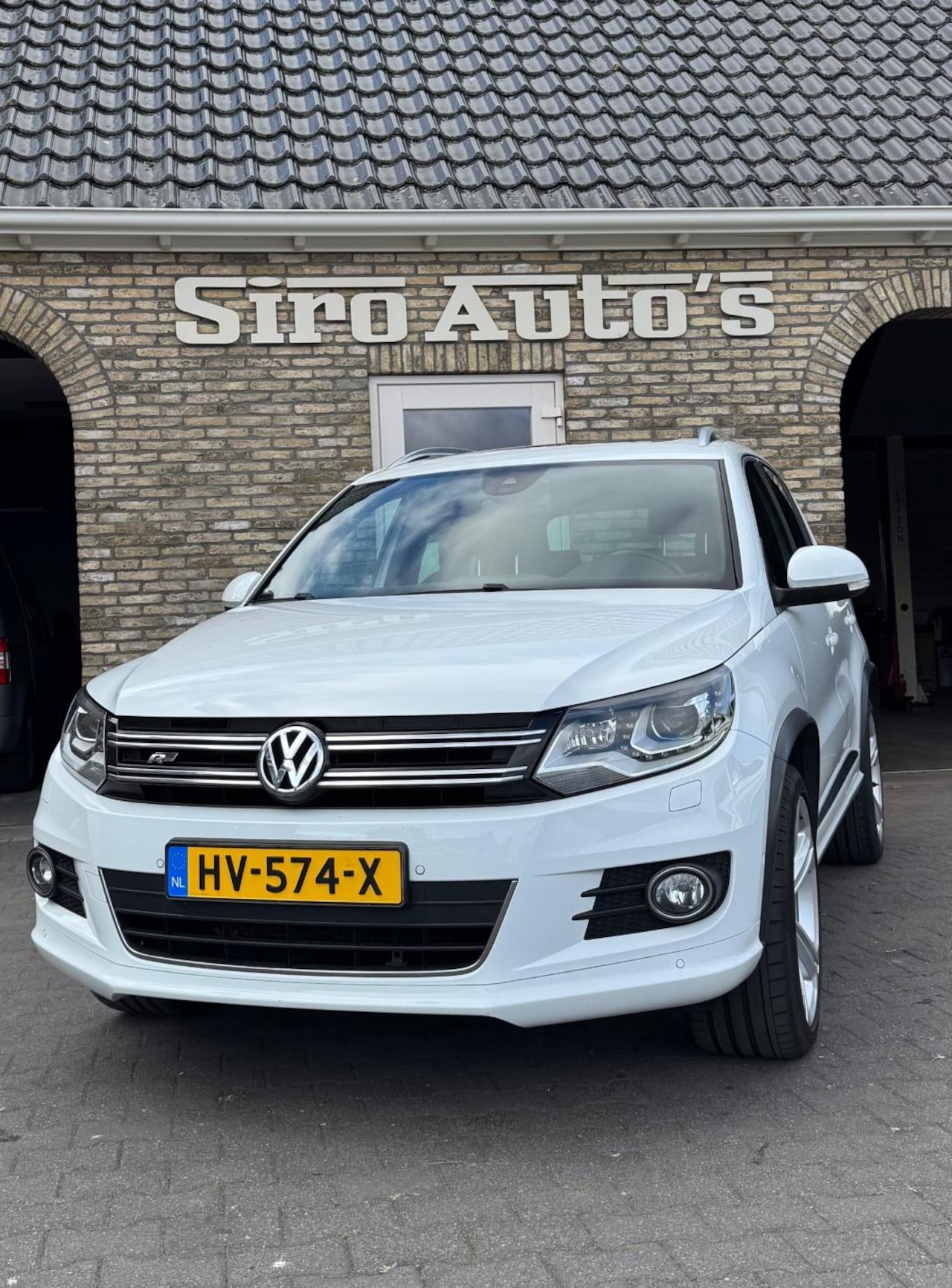 Volkswagen Tiguan - 1.4 TSI R-Line Edition Bj 2016 weinig kilometers - AutoWereld.nl