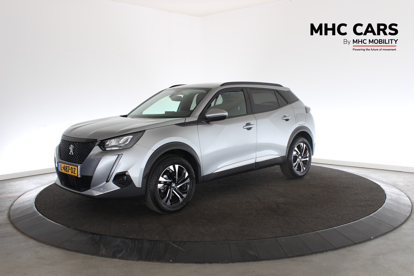 Peugeot 2008 - 1.2 PureTech Allure Pack | Unieke KM's | Carplay | Clima | PDC | - AutoWereld.nl