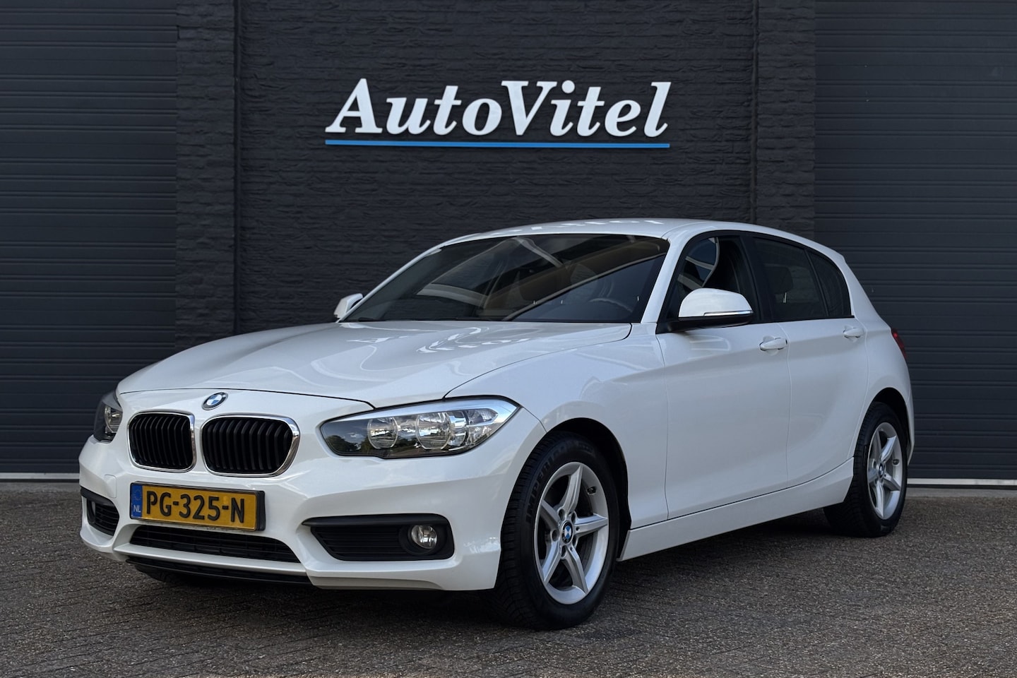 BMW 1-serie - 118i Corporate Lease Automaat | PDC A | Navi | Bluetooth - AutoWereld.nl