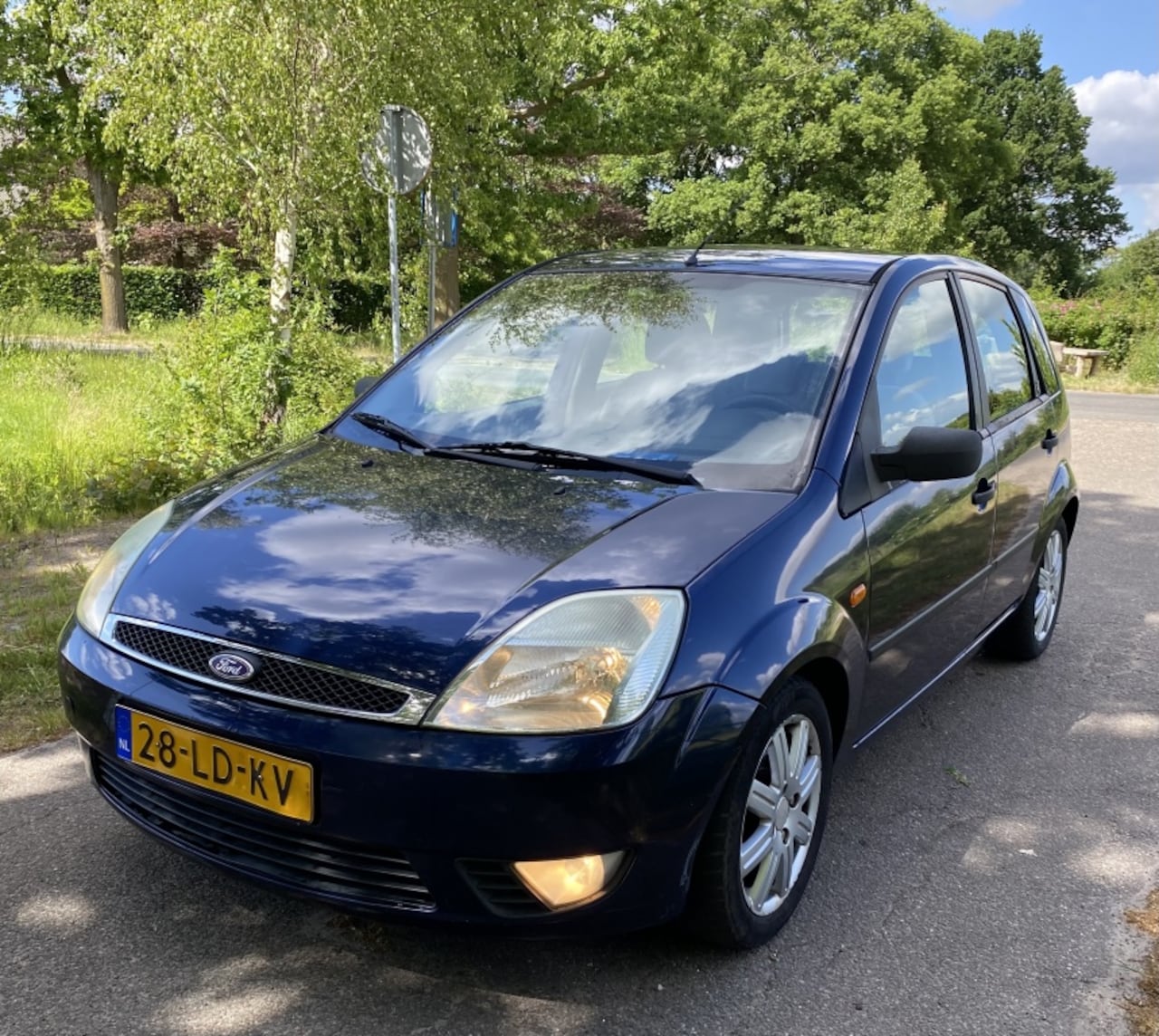 Ford Fiesta - 1.4-16V Ghia 1.4-16V Ghia - AutoWereld.nl
